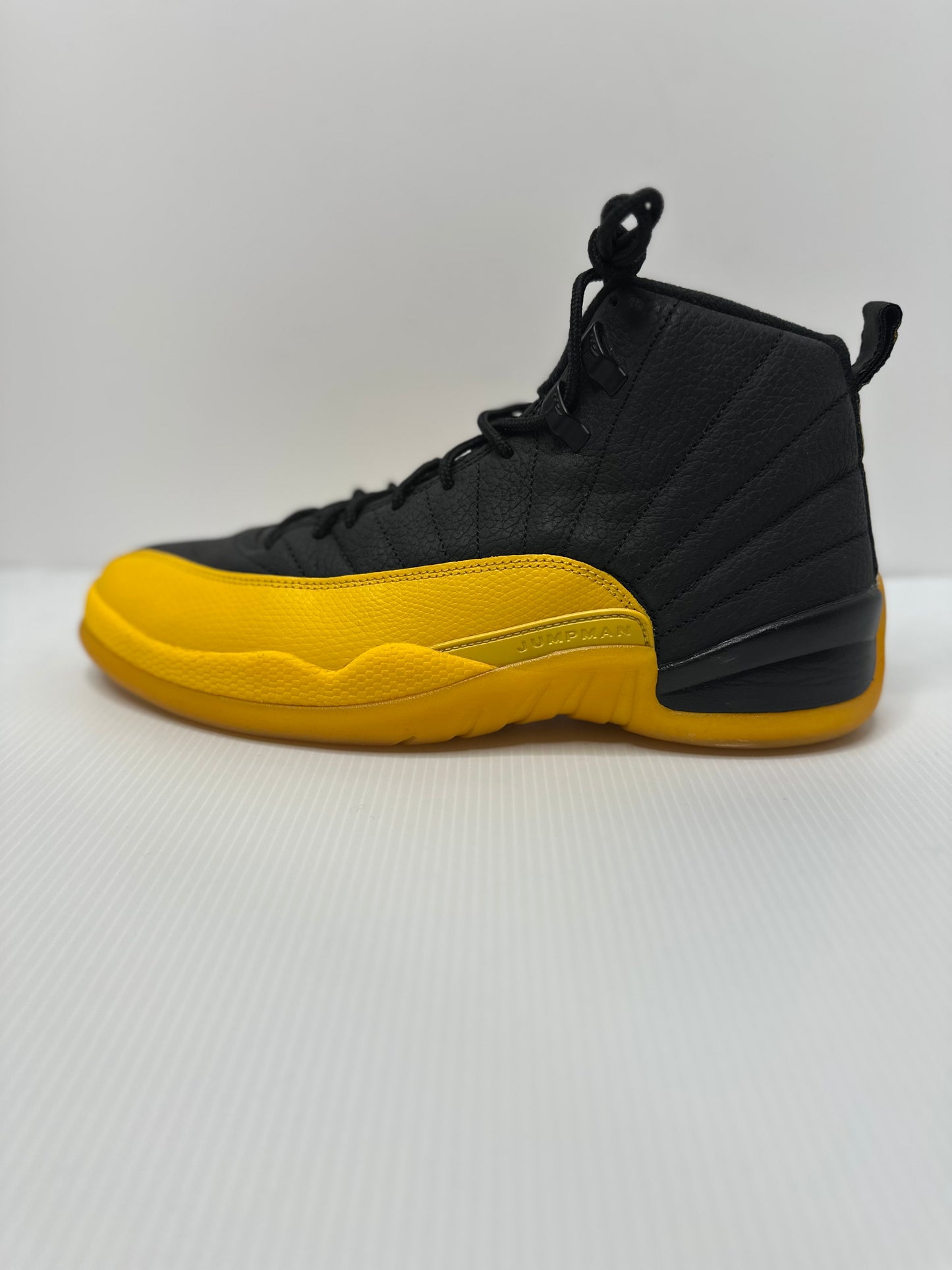 Preowned Jordan 12 Retro Black University Gold