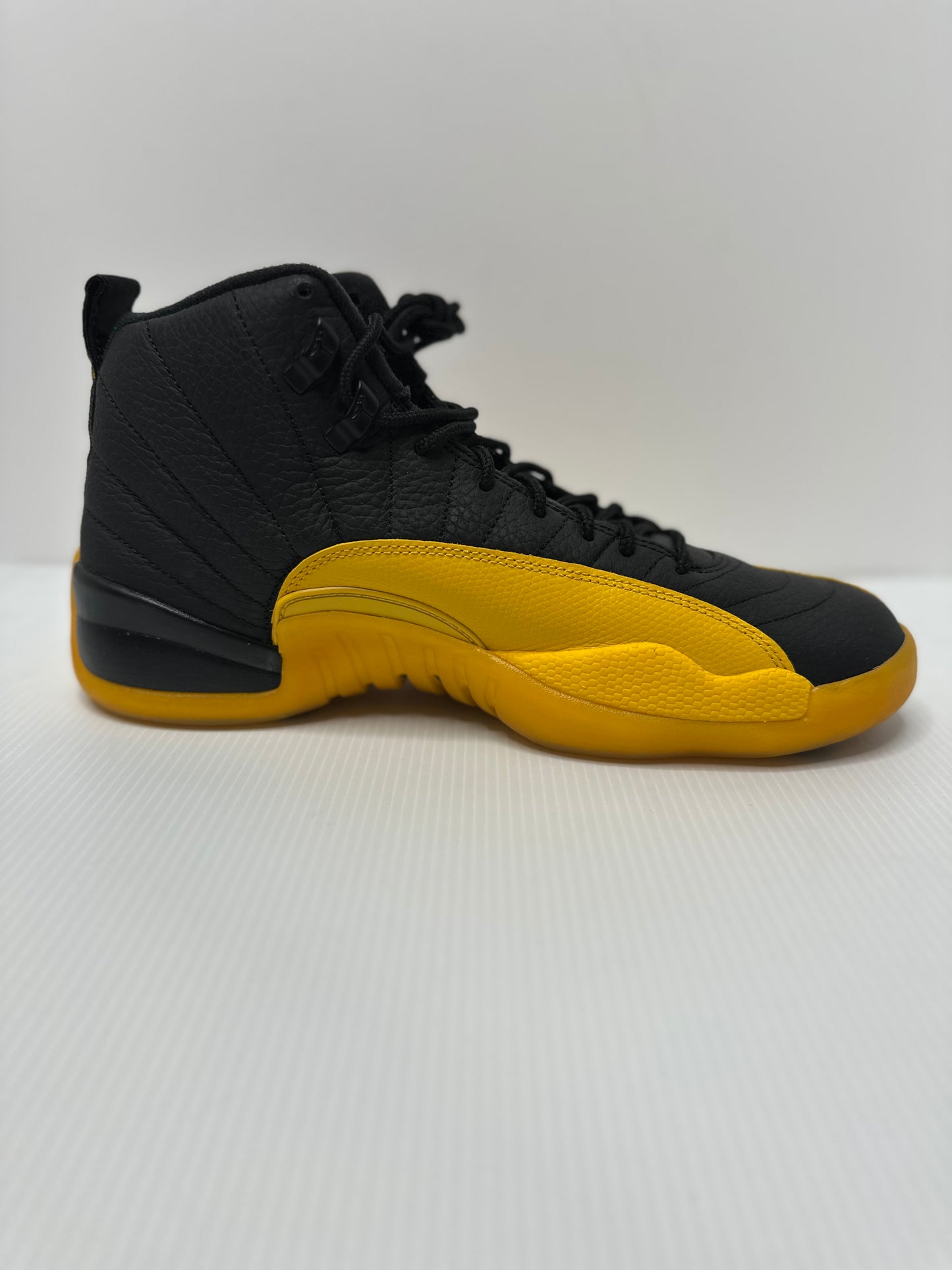 Preowned Jordan 12 Retro Black University Gold